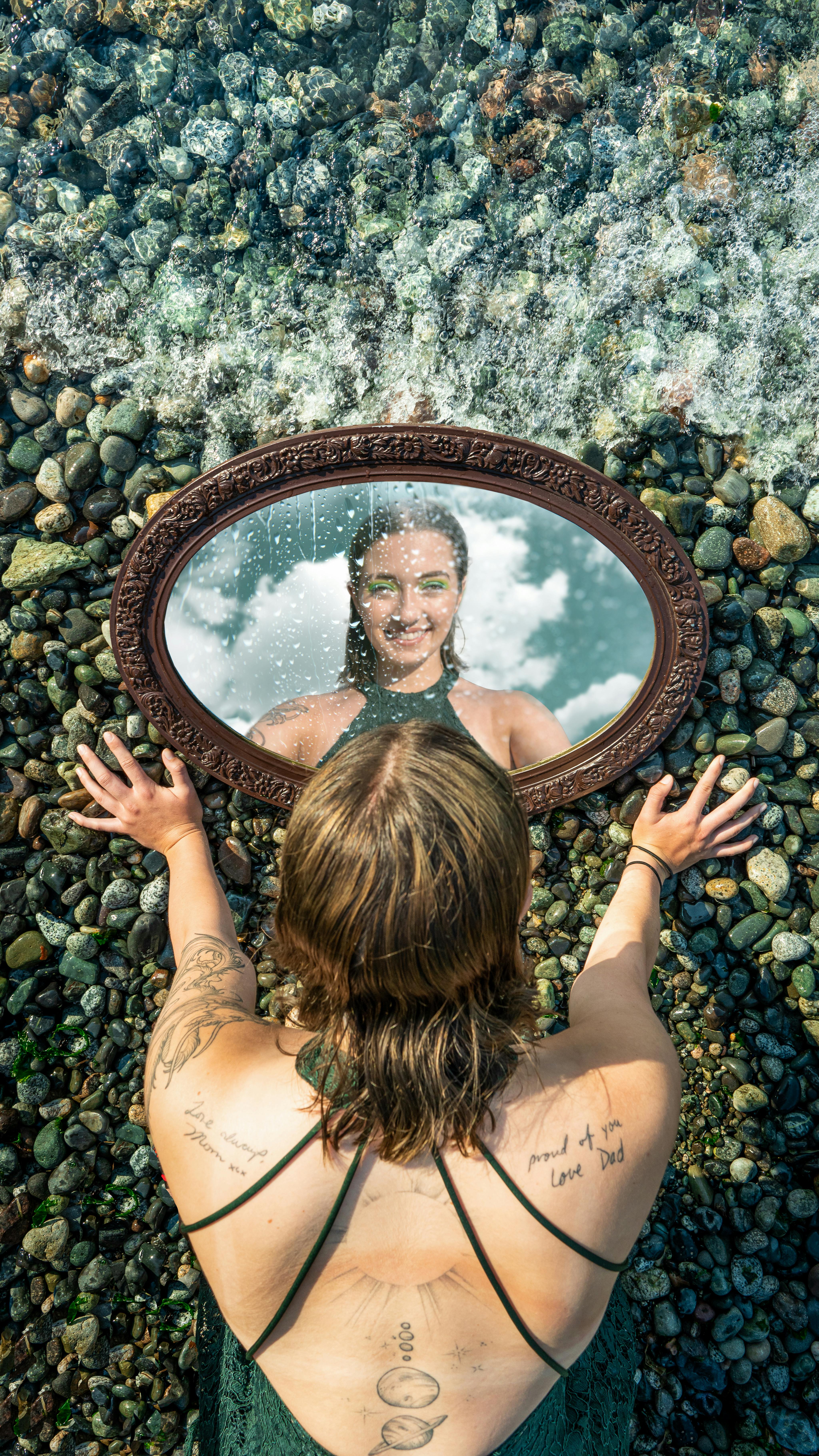 Woman meeting her true self through a personalized birth chart reading, understanding her natal chart for the first time